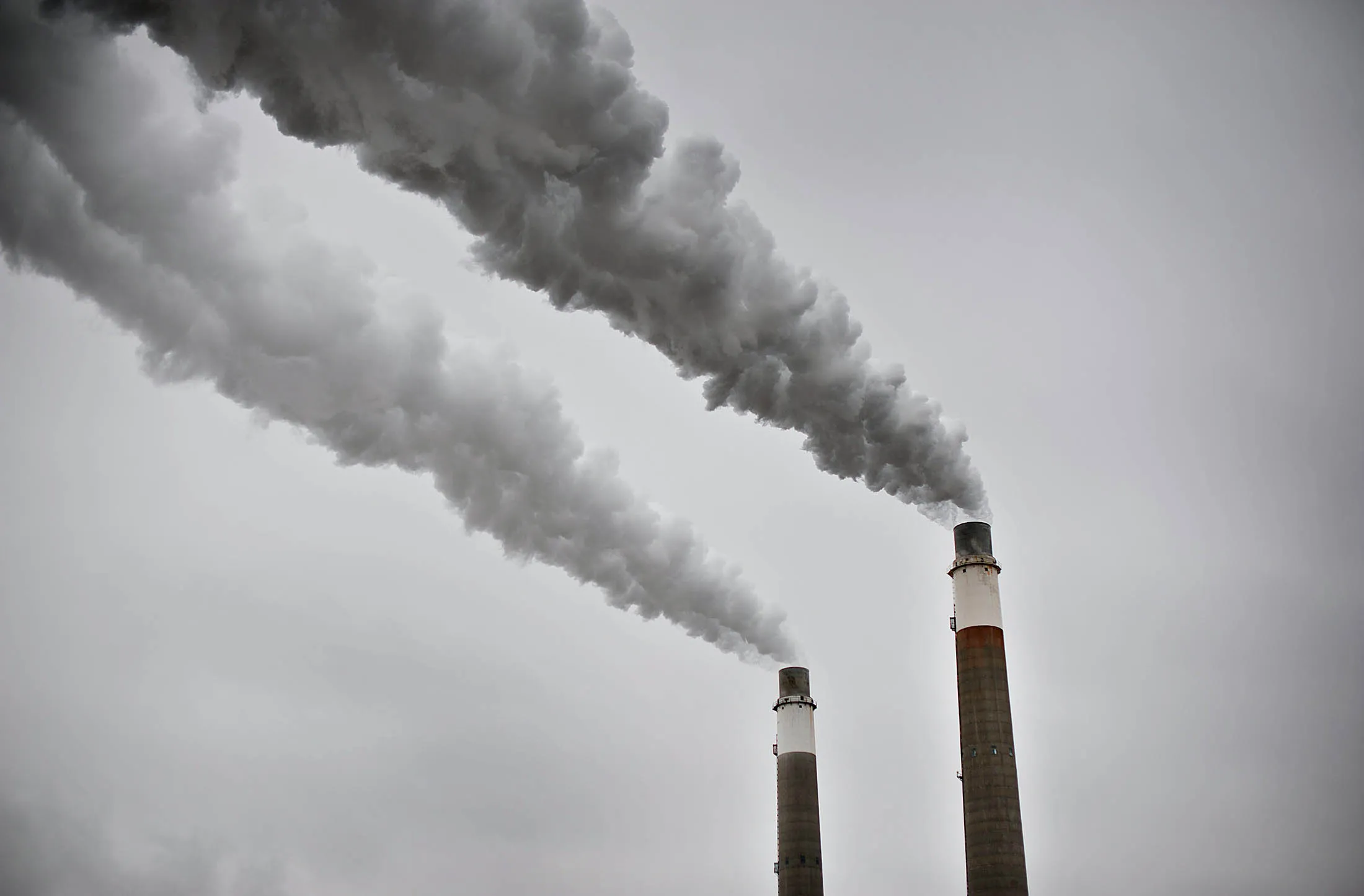 Steam is vented through exhaust stacks at Great River Energy Coal Creek Station coal fueled power plant in Underwood, North Dakota, U.S., on Thursday, Feb. 9, 2012. The power plant, located adjacent to the Great River Energy Blue Flint Ethanol plant, sends what would be waste heat from the power plant to the ethanol plant to dry distillers grains, the remaining solids following ethanol production.
