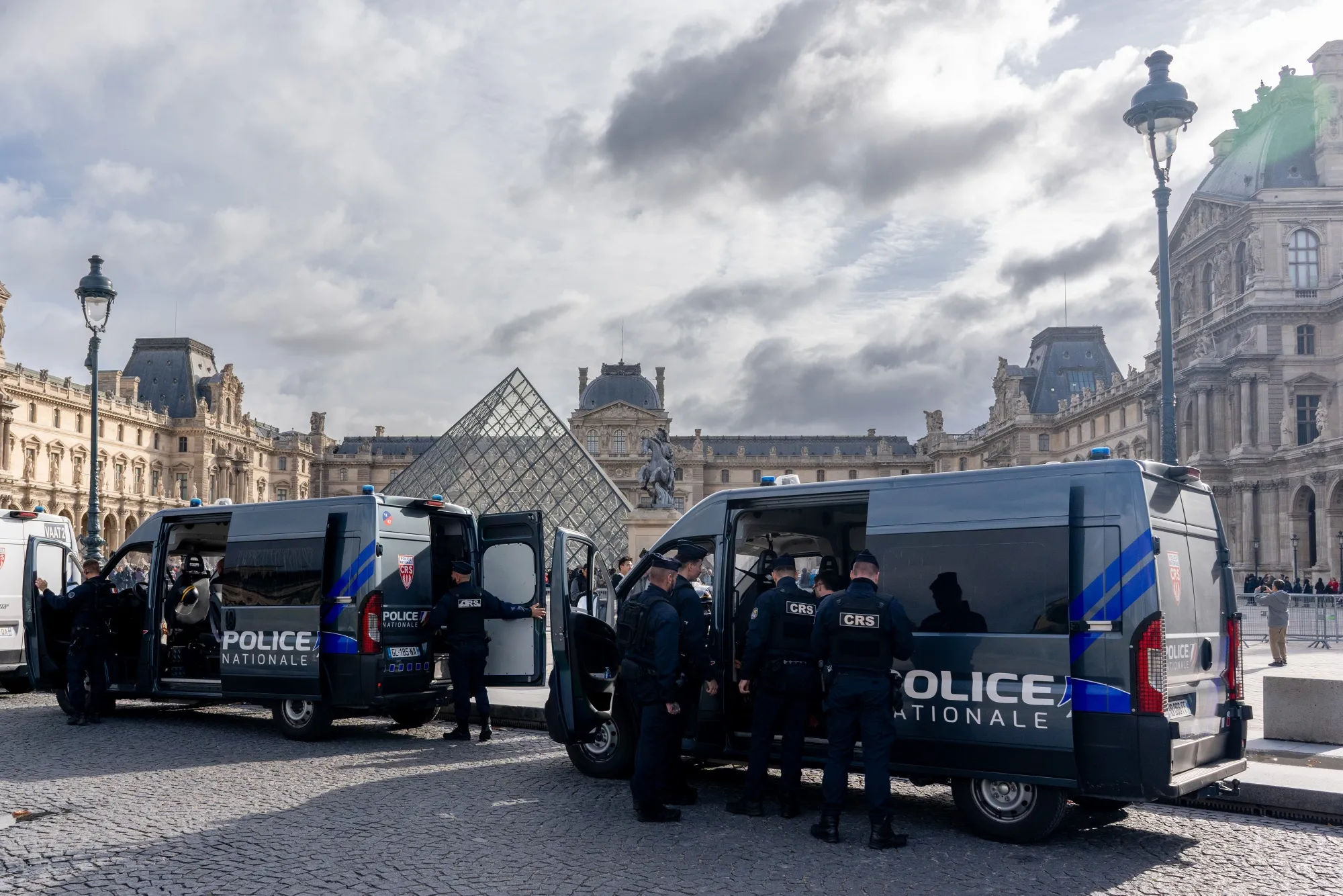 Police officers outside the Louvre Museum in Paris.