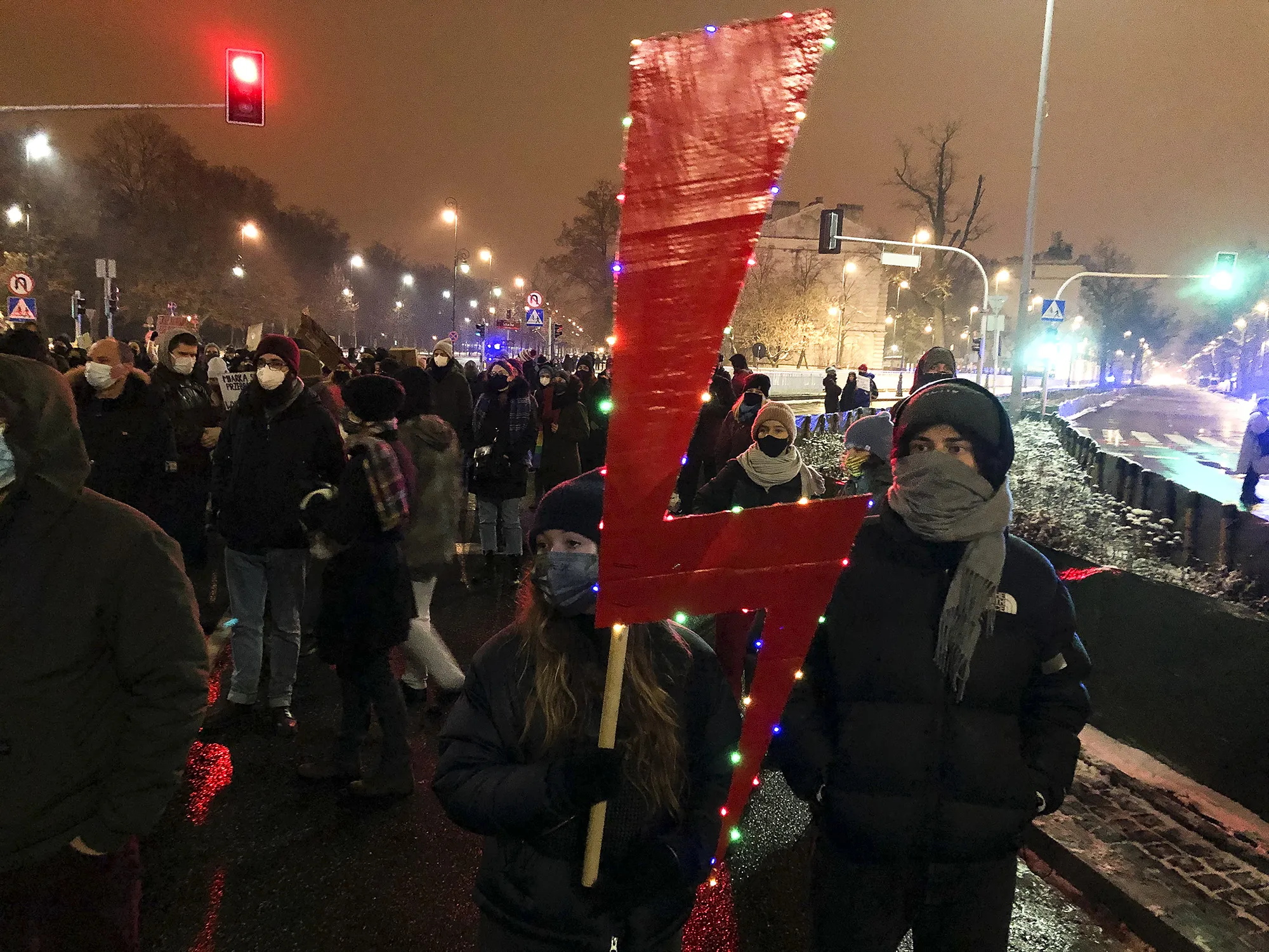 People protest in Warsaw, on Jan. 28.