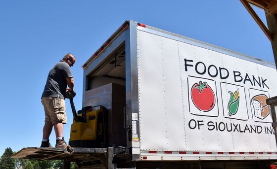 From Bourbon Street to Food Banks, Signs of a Slow U.S. Recovery