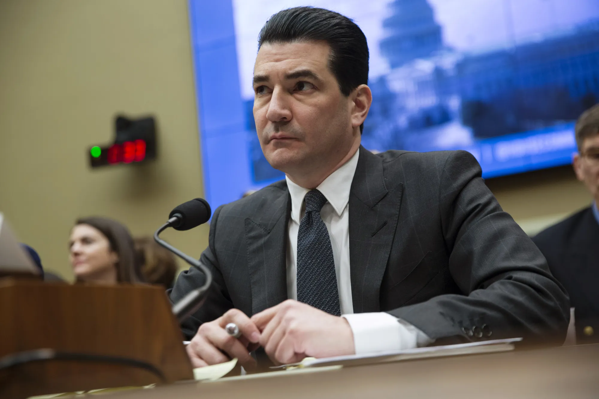 Scott Gottlieb, commissioner of the Food and Drug Administration (FDA) listens during a House Oversight and Investigations Subcommittee hearing in Washington, D.C., U.S., on Thursday, March 8, 2018. The committee is looking for answers on how to improve preparedness during this year's particularly severe flu season and the effectiveness of vaccines.