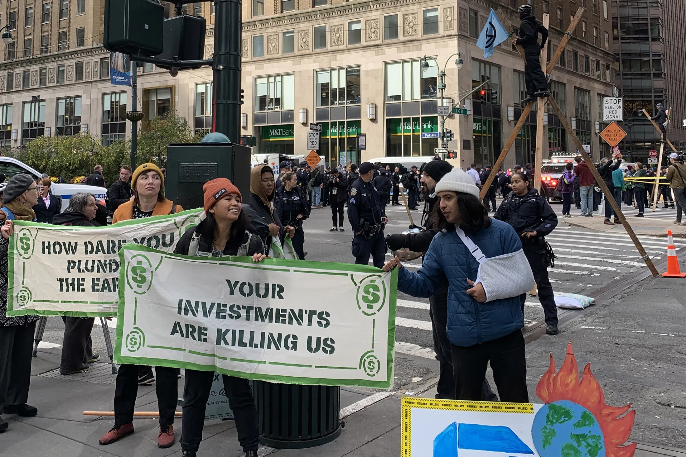 “Occupy Park Avenue” demonstrators during a protest calling for climate action and a tax on the wealthy to fund a “Green New Deal” in New York.