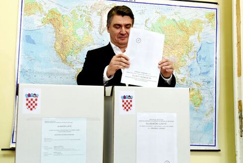 Zoran Milanovic, casts his ballot in Zagreb on Sept. 11.