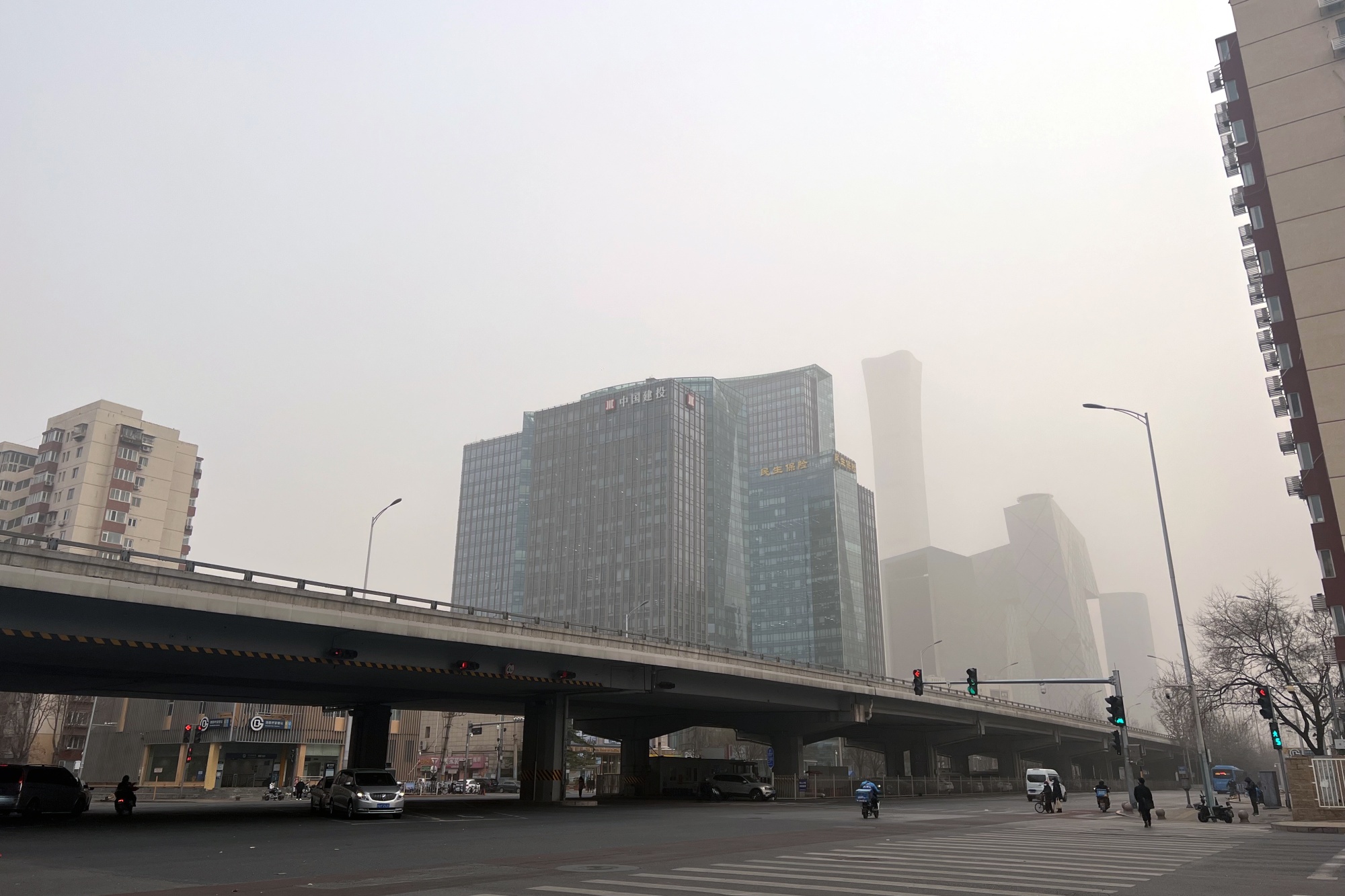 Buildings shrouded in polluted air in Beijing on Dec. 12.