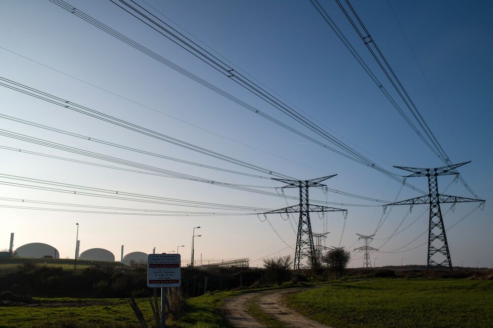Electricity pylons and power lines near a nuclear power plant operated by Electricite de France SA in Normandy, France, on Monday.