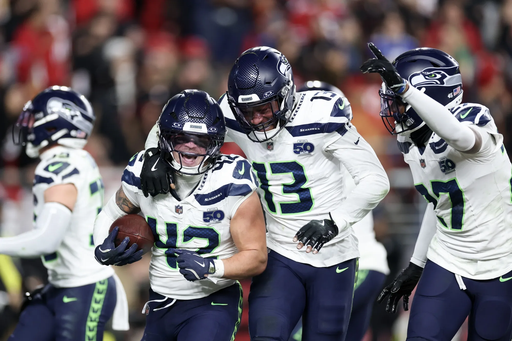 Seattle Seahawks players celebrate after catching an interception against the San Francisco 49ers at Levi's Stadium in Santa Clara, California on Jan. 3.&nbsp;