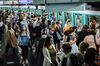 Commuters and Cafe Economy as Pace of Infections Picks Up