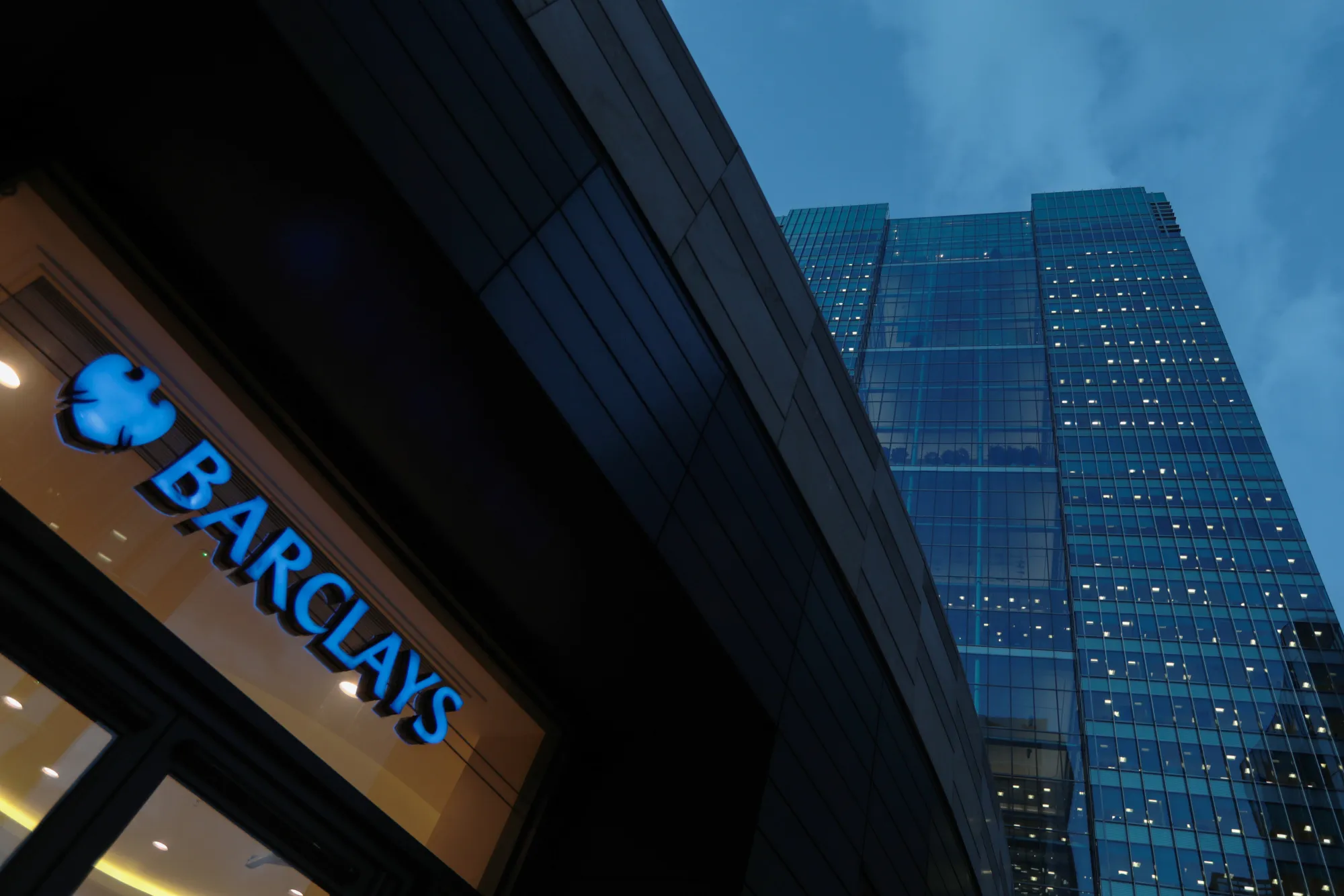 Signage hangs outside the complex of offices at Barclays Plc head offices&nbsp;in London.