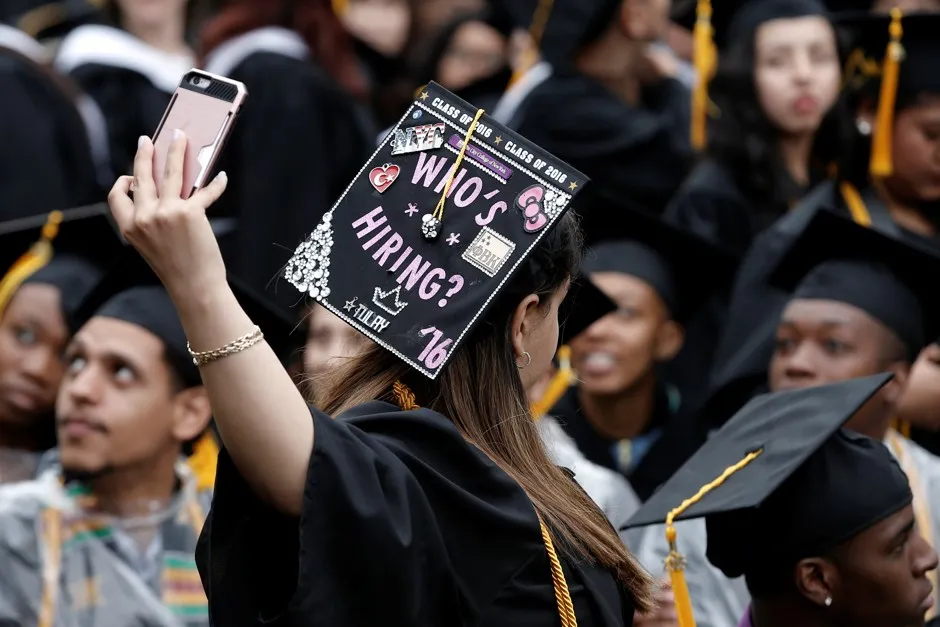 A new graduate of the City College of New York at commencement in June 2016