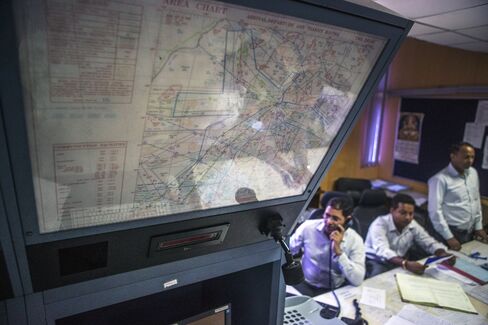 Officers receive flight plan information.