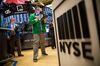 Traders work on the floor of the New York Stock Exchange (NYSE) in New York, U.S., on Friday, April 5, 2019. U.S. stocks climbed toward all-time highs, the dollar strengthened and Treasury yields fell after a report showed the economy is adding jobs with few signs of inflation and President Donald Trump pressured the Federal Reserve to sustain growth.