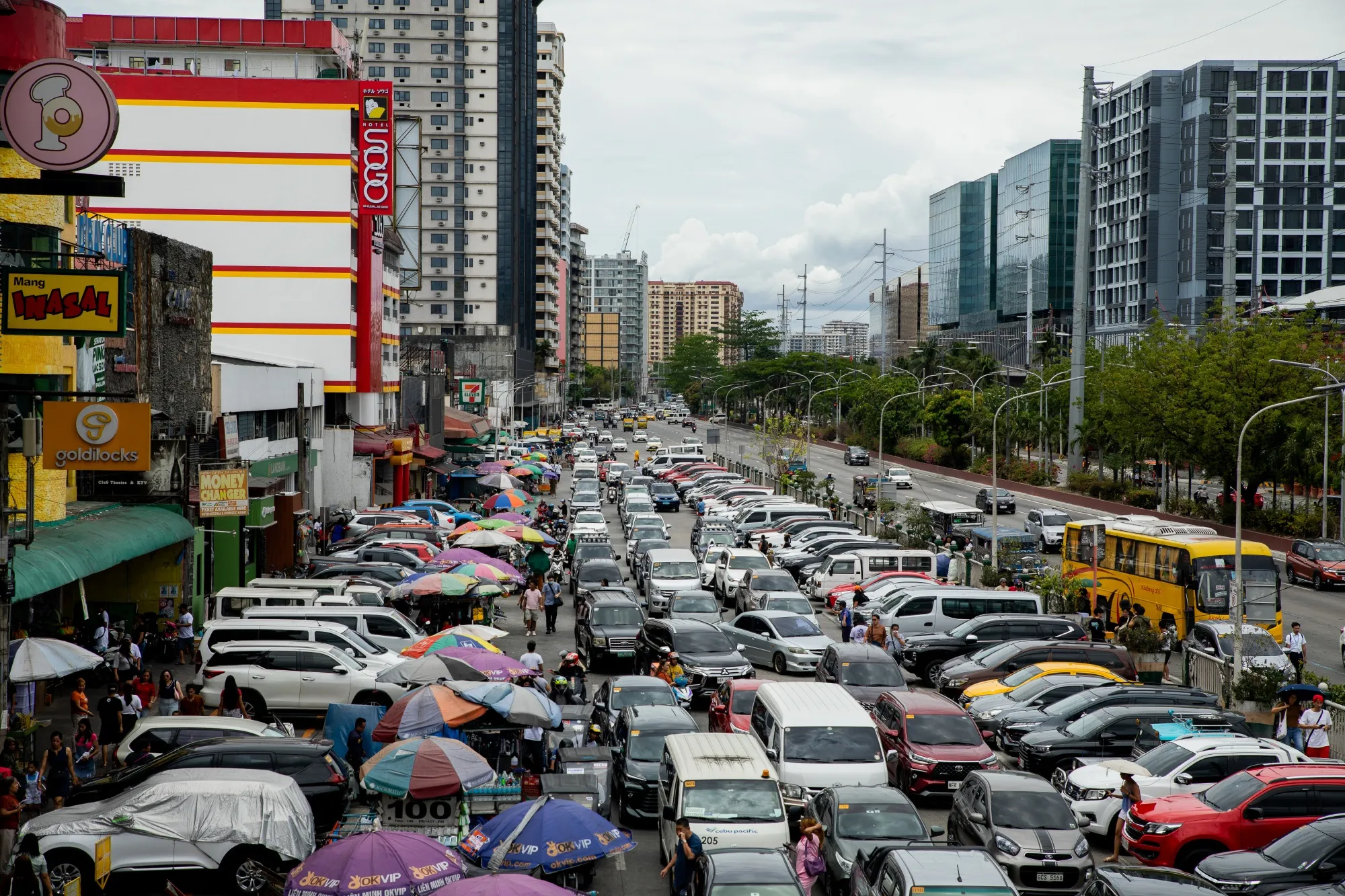Motorists in traffic along the Roxas Boulevard in Manila, the Philippines