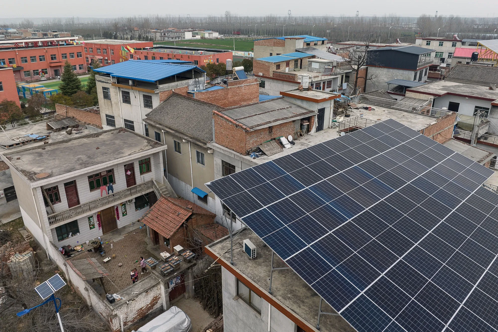 Longi Green Energy Technology&nbsp;solar panels on the rooftop of a house in the village of Yang Zhuang, Shaanxi province, China.