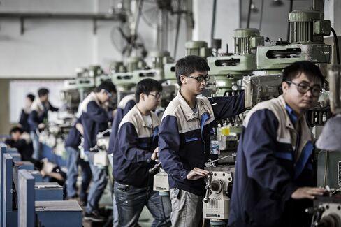 Workers on the assembly line at the Lyric Robot factory in Huizhou.