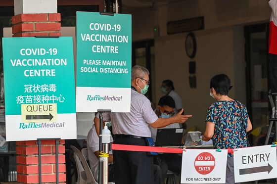 Singapore Workers Who Refuse Vaccination Risk Losing Jobs