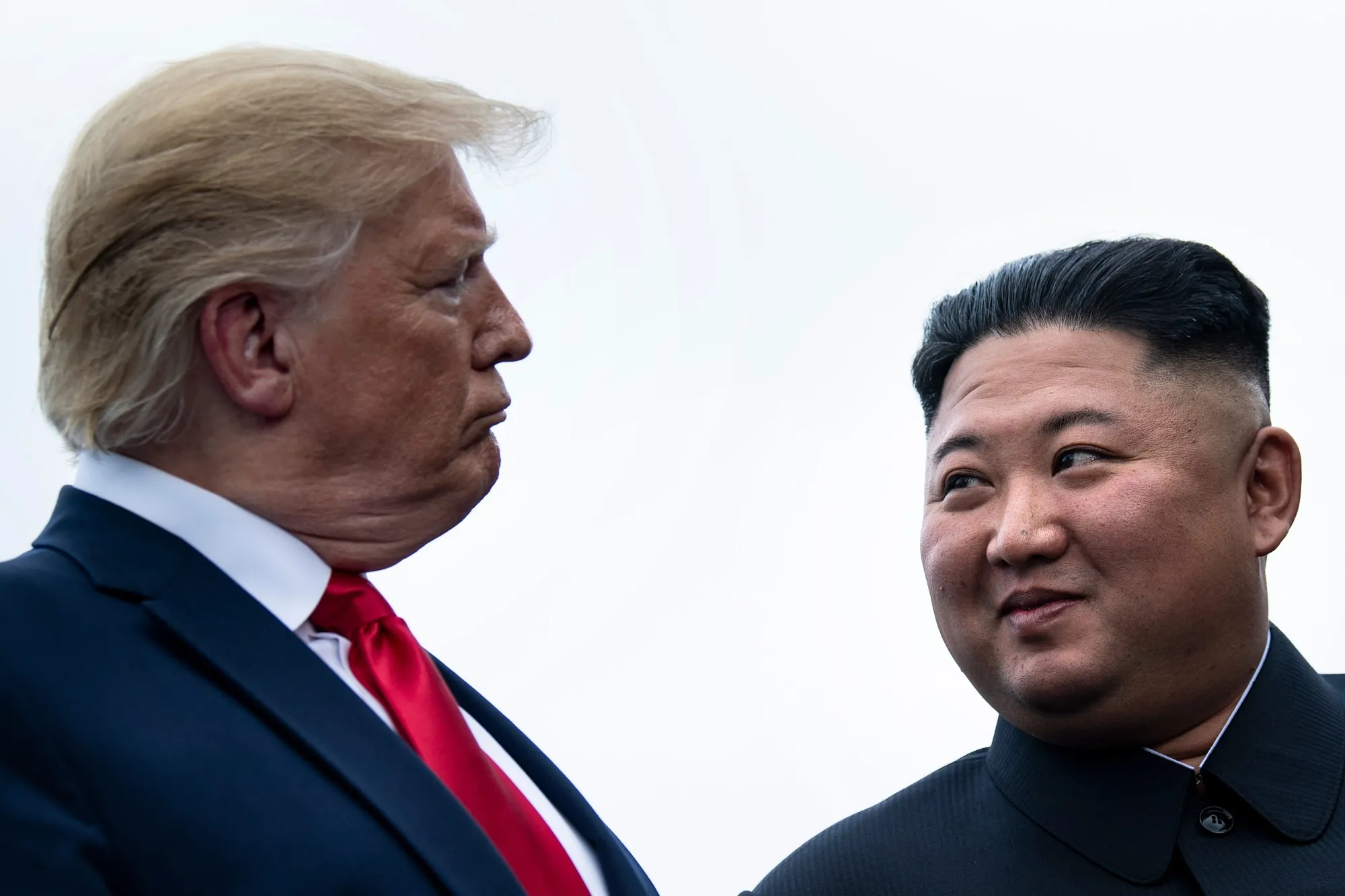 President Donald Trump and North Korea's leader Kim Jong-un talk before a meeting in the Demilitarized Zone on June 30, 2019.&nbsp;