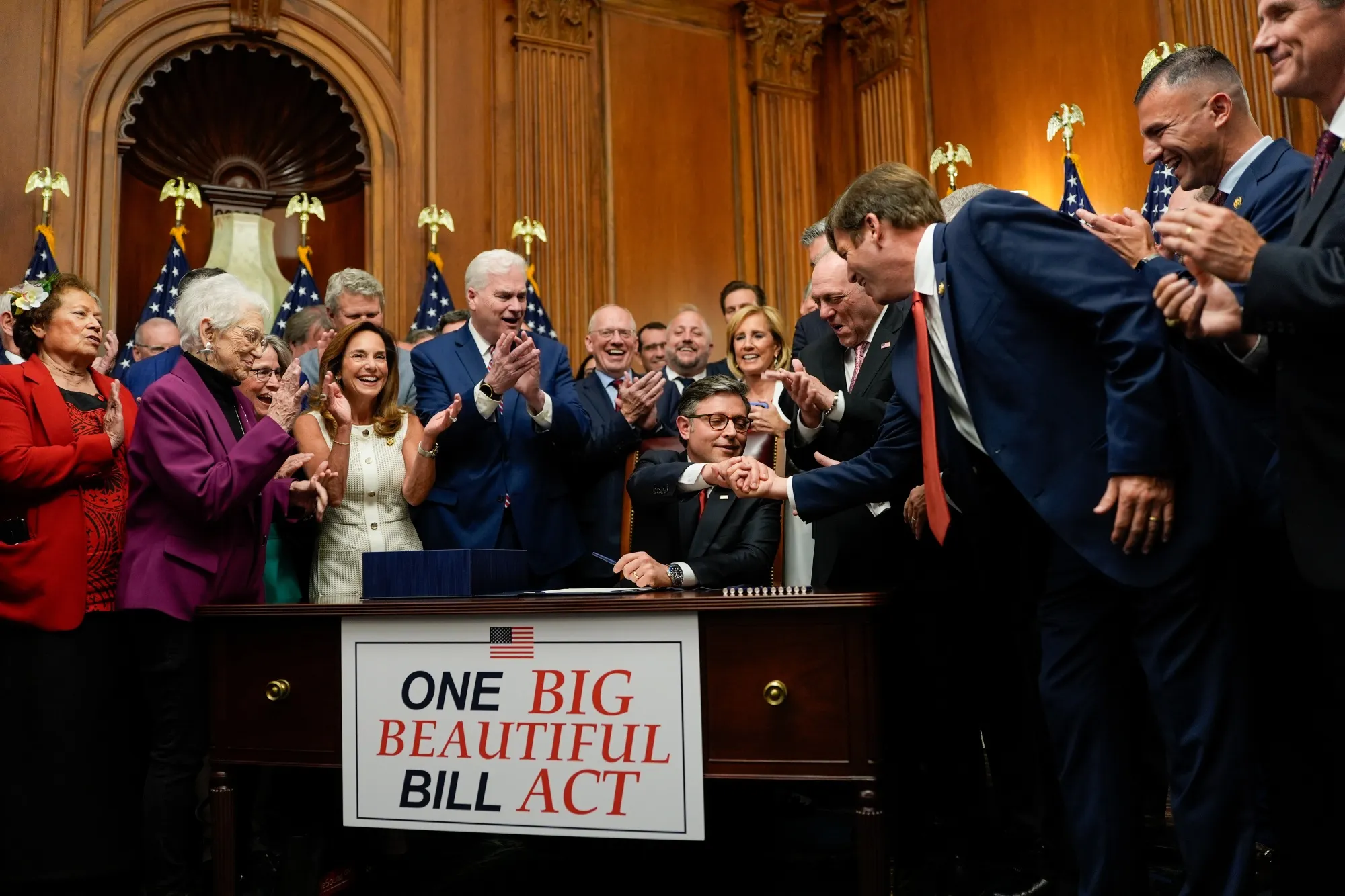 US House Speaker Mike Johnson,&nbsp;center, during a ceremony following the passage of the “One Big Beautiful Bill Act”&nbsp;on&nbsp;July 3.