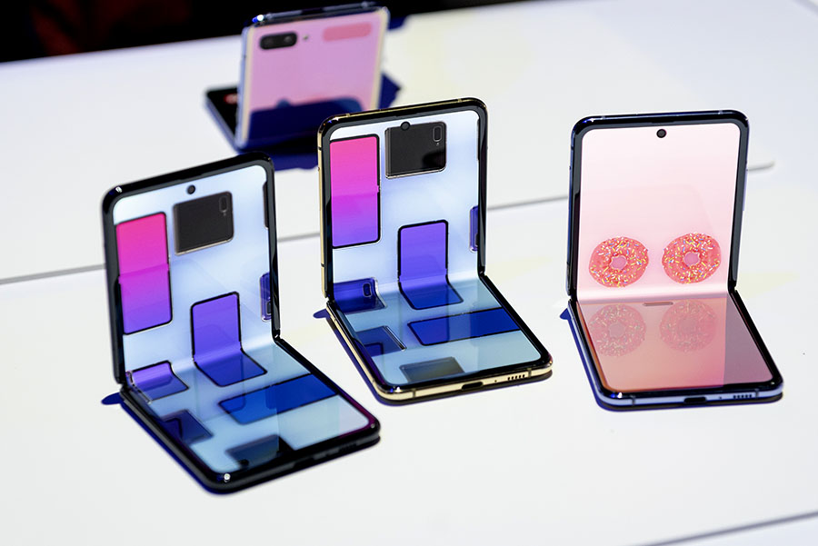 Samsung Electronics Co. Galaxy Z Flip smartphones are displayed during the Samsung Unpacked product launch event in San Francisco, California, U.S. on Tuesday, Feb. 11, 2020.