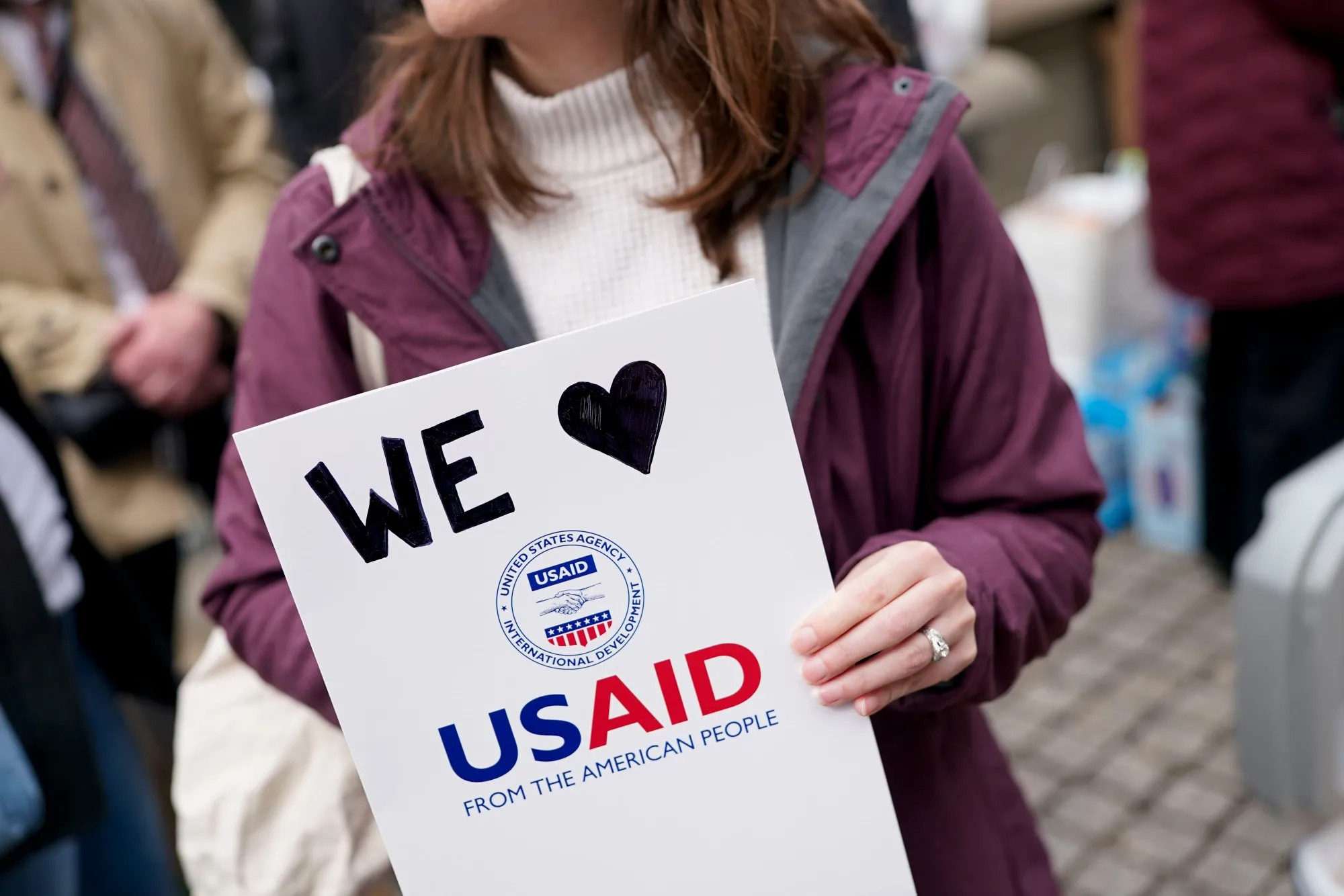 A demonstrator holds a sign&nbsp;in Washington, DC, in February.