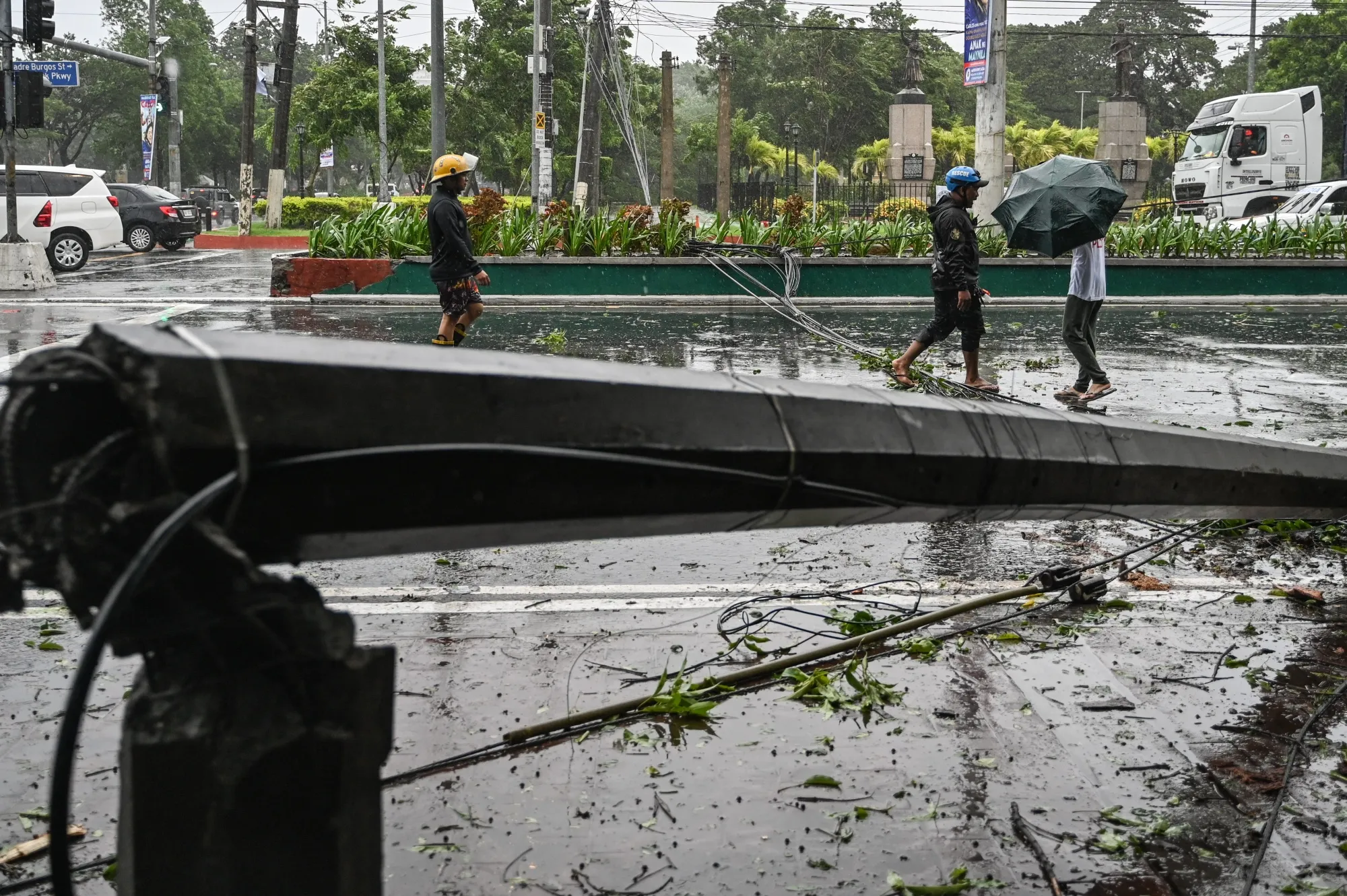A fallen electrical post brought down by strong winds due to Tropical Storm Yagi in Manila on Sept. 2.
