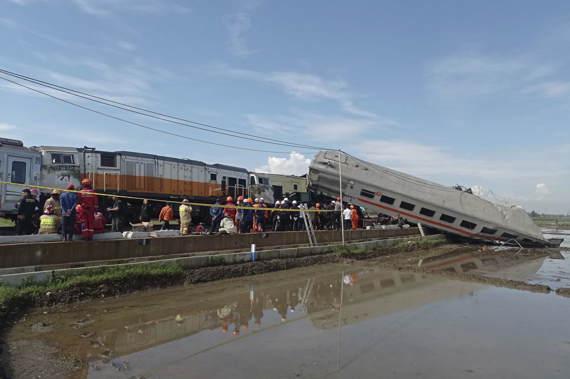 Rescuers inspect the wreckage of trains after a collision in Cicalengka, West Java,&nbsp; on Jan. 5.