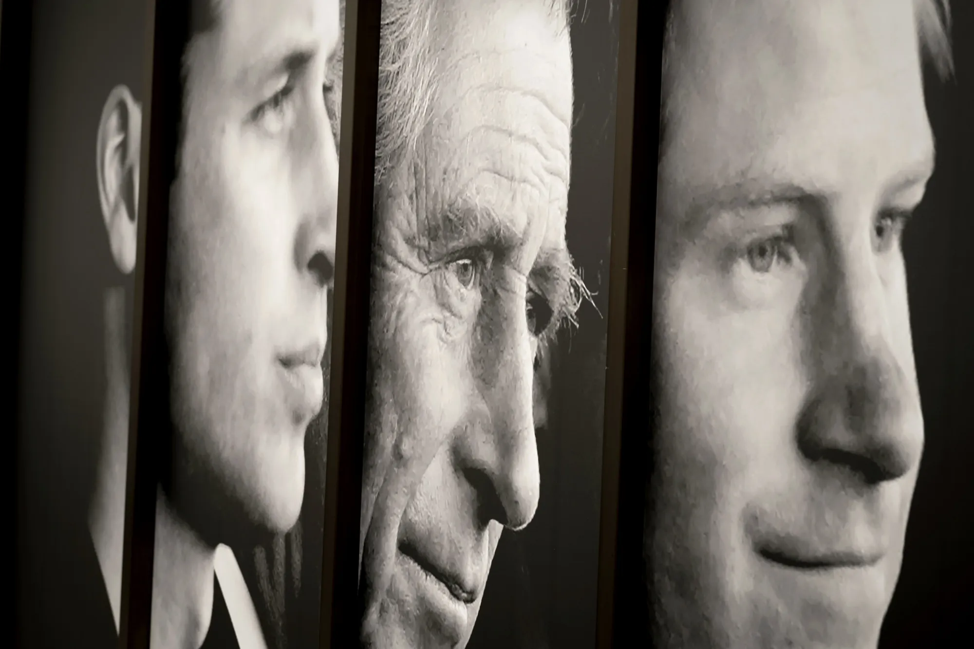 Posters of King Charles III, William the Prince of Wales and&nbsp;Harry Duke of Sussex outside the Intercontinental Hotel in London, on May 2.