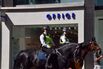 Police officers on horses patrol Oxford Street