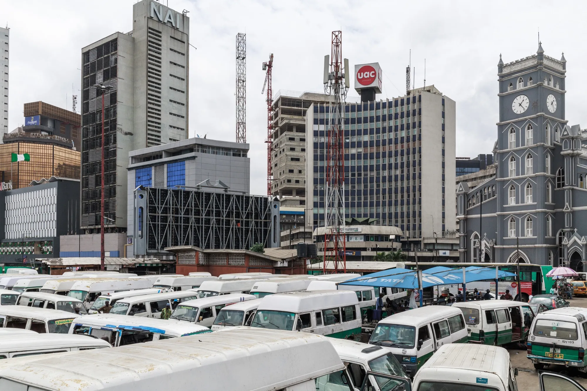 City buses outside the Lagos Commodities and Futures Exchange (LCFE) office&nbsp;on Lagos Island in Lagos, Nigeria.
