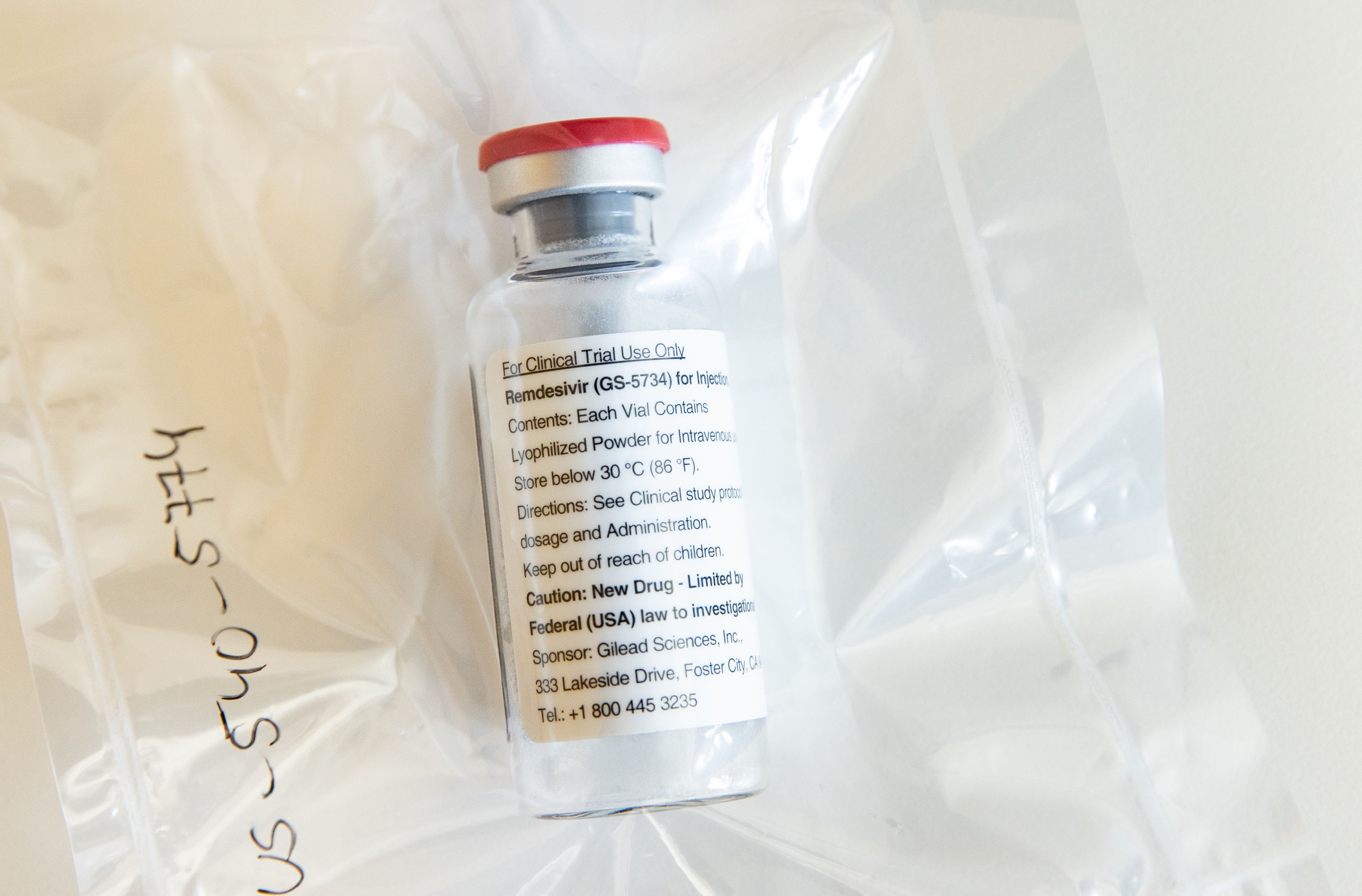 One vial of the drug Remdesivir lies during a press conference about the start of a study with the Ebola drug Remdesivir in particularly severely ill patients at the University Hospital Eppendorf (UKE) in Hamburg, northern Germany on April 8, 2020, amidst the new coronavirus COVID-19 pandemic.