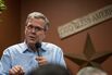 Jeb Bush, former governor of Florida, gestures as he speaks during an event at a Pizza Ranch restaurant in Cedar Rapids, Iowa, U.S., on Saturday, March 7, 2015.
