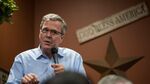 Jeb Bush, former governor of Florida, gestures as he speaks during an event at a Pizza Ranch restaurant in Cedar Rapids, Iowa, U.S., on Saturday, March 7, 2015.
