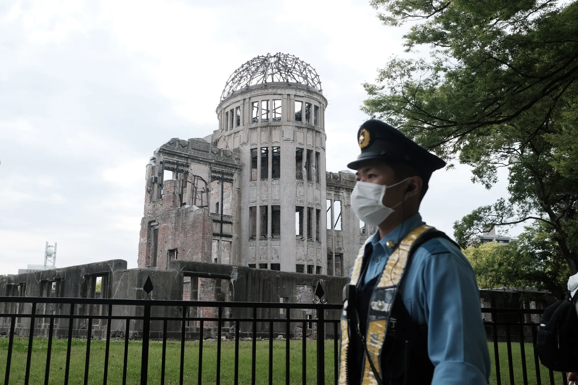 A police officer in front of the Atomic Bomb Dome at the Hiroshima Peace Memorial Park ahead of the G-7 summit.