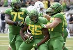 Oregon Ducks players celebrate&nbsp;after scoring a touchdown during a game&nbsp;in Eugene, Oregon.&nbsp;