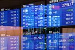 Screen display stock figures inside the Tokyo Stock Exchange (TSE), operated by Japan Exchange Group Inc. (JPX), in Tokyo, Japan.