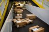 Boxes move along a conveyor belt at the Amazon.com Inc. fulfillment center on Cyber Monday in Robbinsville, New Jersey, U.S., on Monday, Nov. 30, 2015.