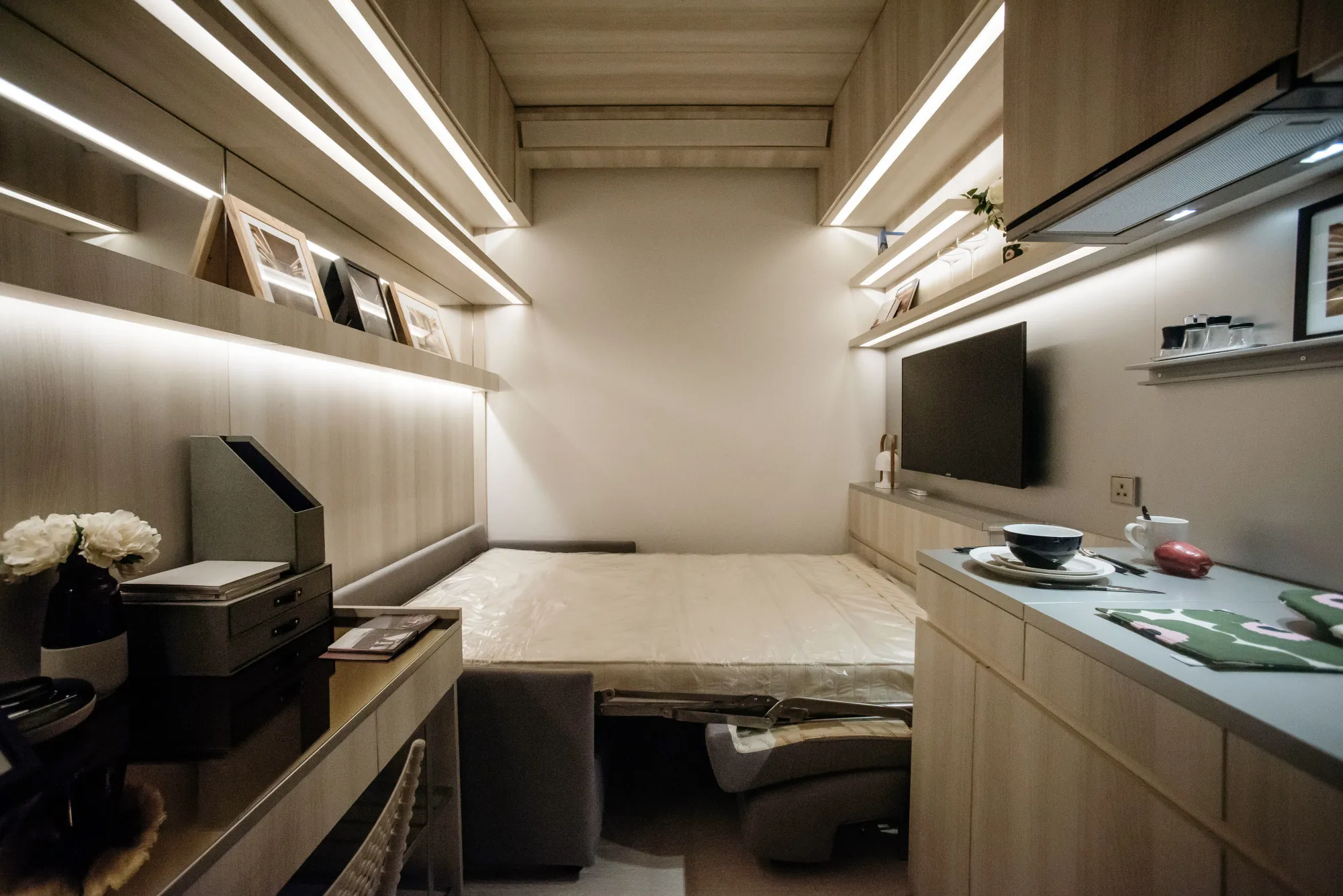 A sofa bed inside a nano-apartment show home in Hong Kong.