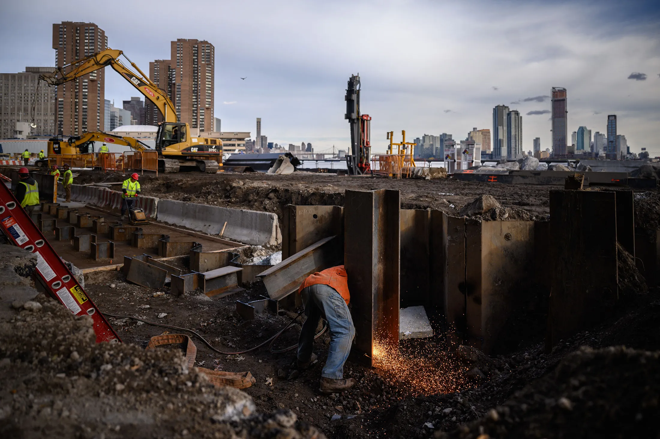 Contractors work at the site of a flood defense project on the East side of Manhattan, New York City, in 2021.
