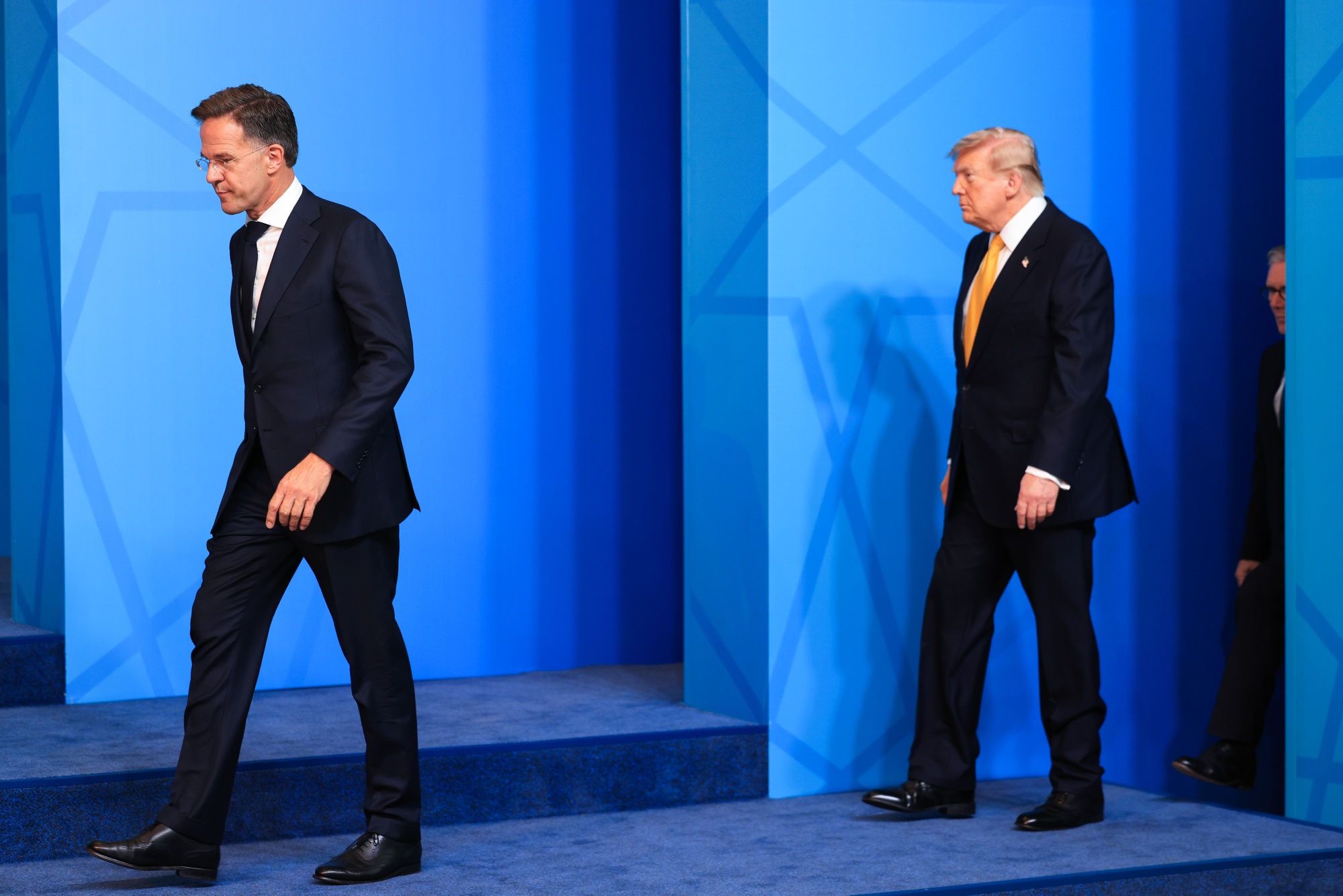 Mark Rutte, secretary general of the North Atlantic Treaty Organization (NATO), left, and US President Donald Trump, at the NATO Summit in Ankara, Turkey, on Wednesday, July 8, 2026. Turkey is hosting leaders of NATO nations amid growing concerns over Washington's long-term commitment to European security. Photographer: Krisztian Bocsi/Bloomberg
