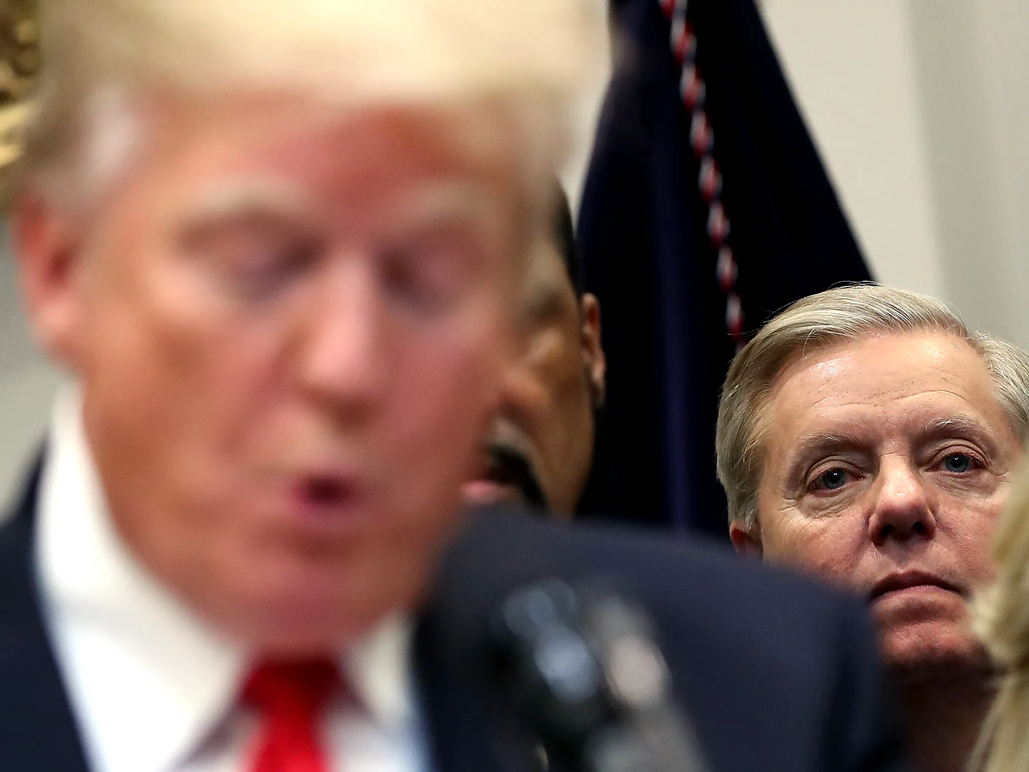 Lindsey Graham listens to Donald Trump speak&nbsp;in Washington, D.C. in 2018.&nbsp;