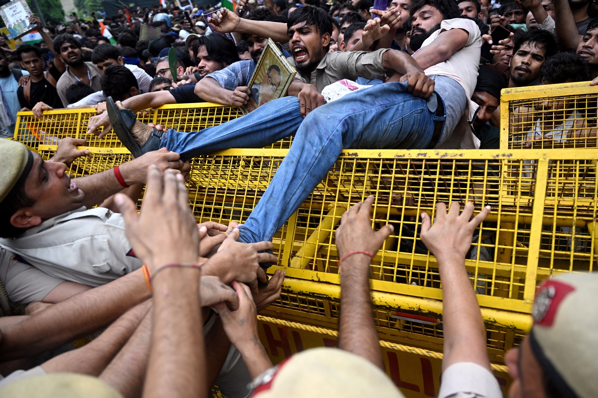 Activists and supporters of the CJP clash with police personnel during a protest in New Delhi on July 20. Photographer: Arun Sankar/AFP/Getty Images