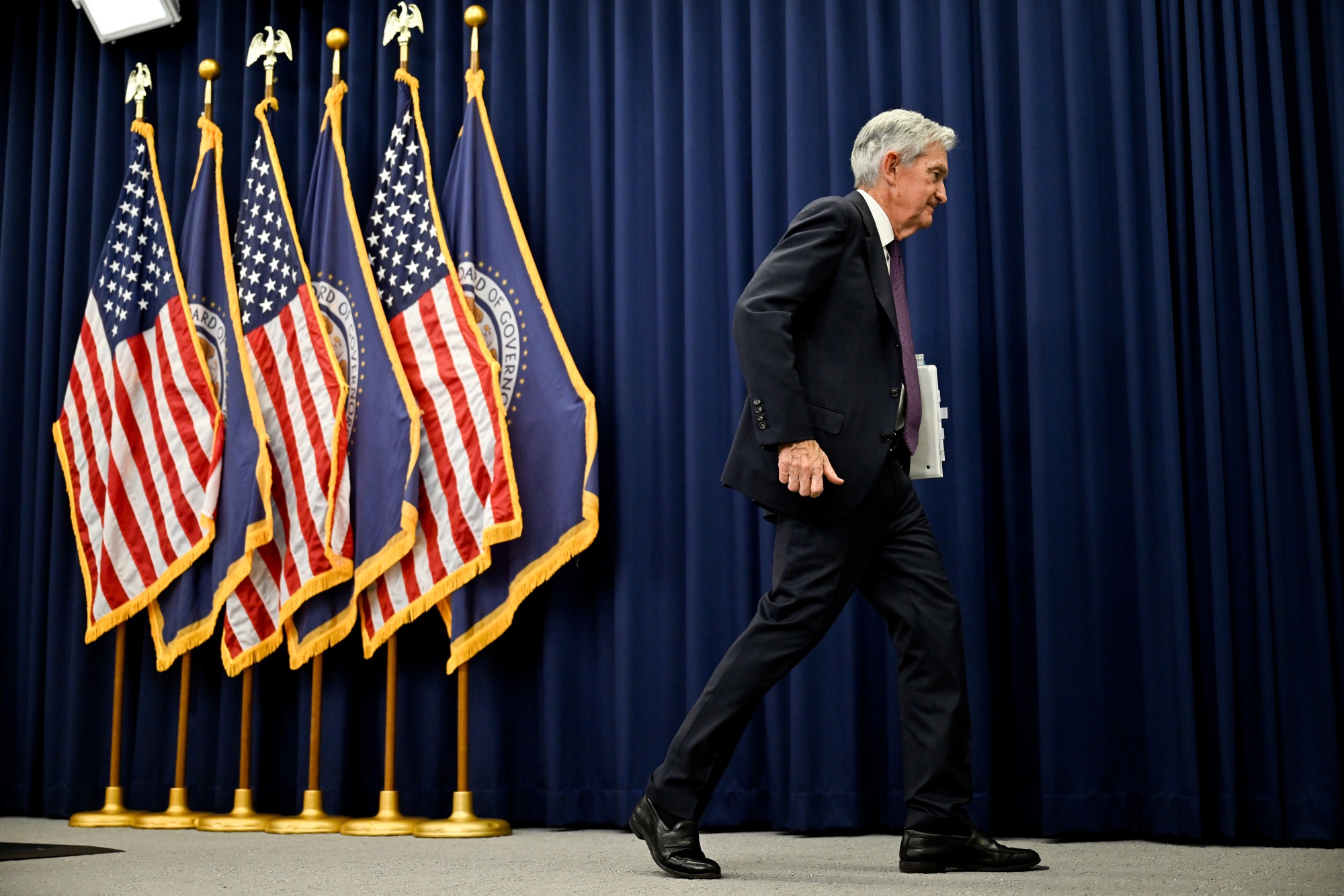 Jerome Powell, chairman of the US Federal Reserve, departs following a news conference following a Federal Open Market Committee (FOMC) meeting in Washington, DC, US, on Wednesday, April 29, 2026. Federal Reserve officials left interest rates unchanged, but revealed a deepening division over the outlook for policy amid increased uncertainty caused by the conflict in the Middle East. Photographer: Daniel Heuer/Bloomberg
