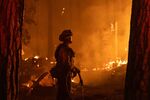 The Dixie Fire burns multiple structures near Crescent Mills, California, on July 24, 2021.