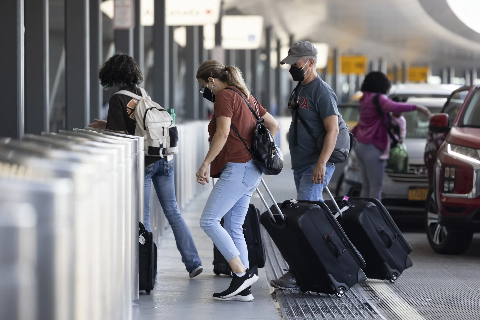 Travelers at LaGuardia Airport&nbsp;in&nbsp;New York on July 1.