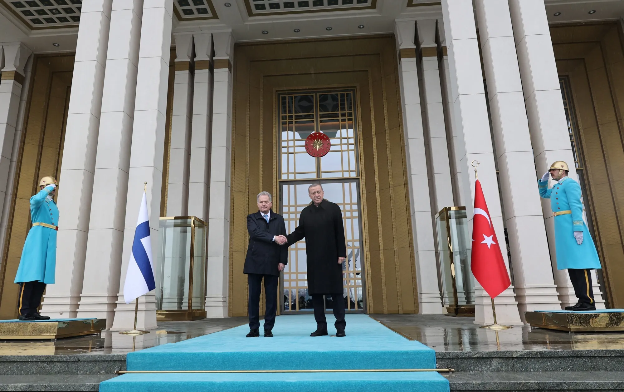 Recep Tayyip Erdogan, right, greets Sauli Niinisto in Ankara on March 17.