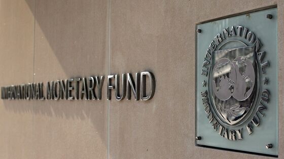 IMF Sees Shallower Recession, Tough Path Back to Recovery