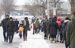 Residents wait in line outside a Covid-19 testing center in Montreal, Canada, on Dec. 22.