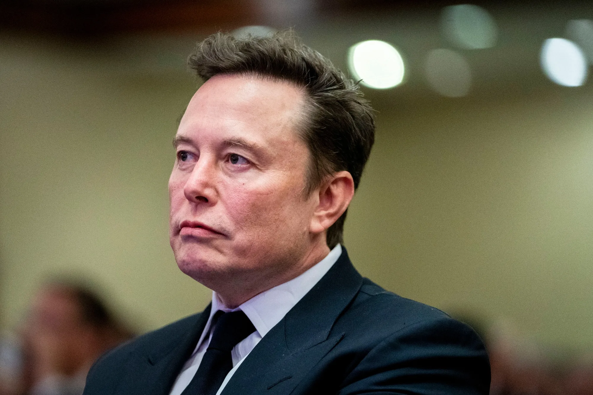 Musk Sues Apple, OpenAI, Saying They Hurt AI Competition - Bloomberg