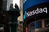 A monitor displays signage in front of the Nasdaq MarketSite in the Times Square area of New York, U.S.