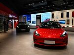 Tesla Model 3 EVs at a Tesla&nbsp;showroom&nbsp;in Beijing.