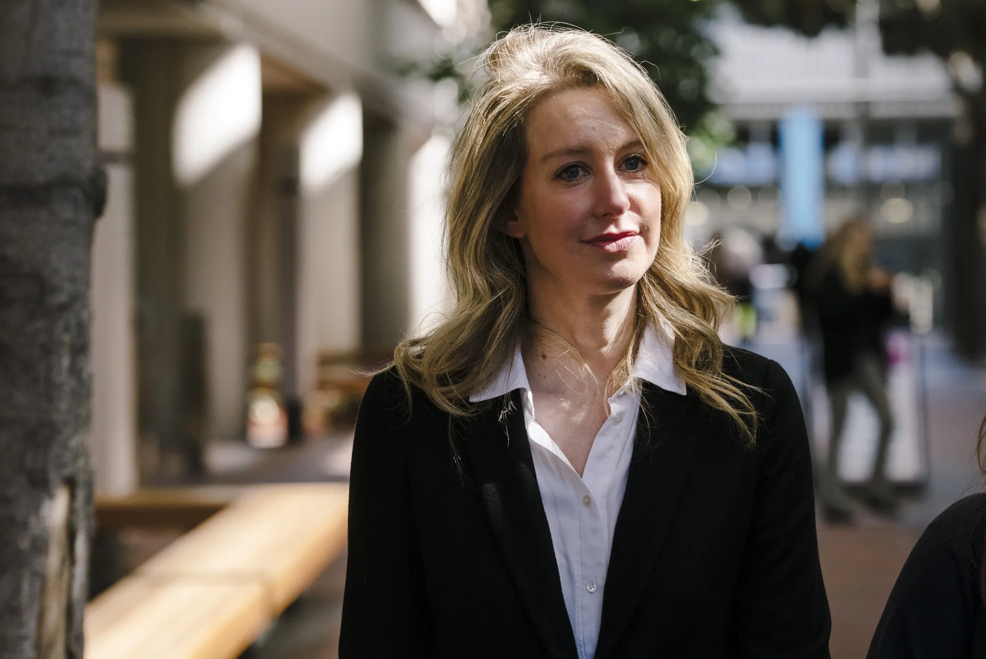 Elizabeth Holmes leaves federal court in San Jose, California in 2019.